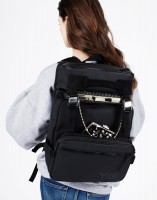 Sweatshirt by Slow and Steady Wins the Race, backpack by Y-3 and clutches by Jessica Simpson.