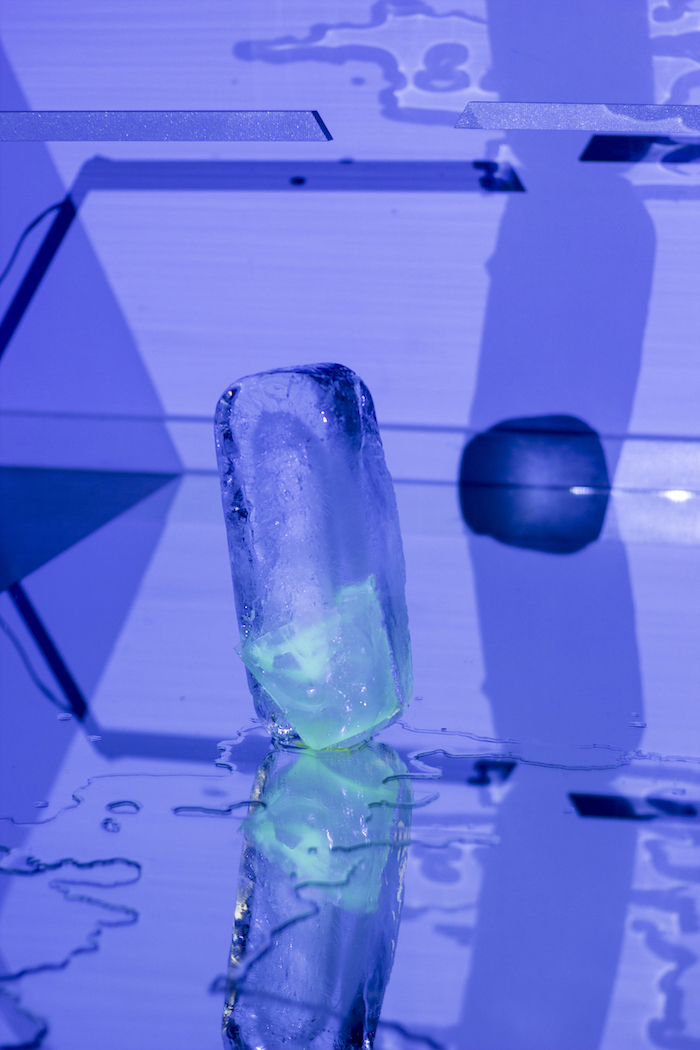 Pakui Hardware, Get The Freeze Habit, 2015. Silicone, resin, ice, mirror, Casio projector, SD Laser 303, office chair, found images on the Internet . Produced while in residence at Nida Art Colony of the Vilnius Academy of Arts 