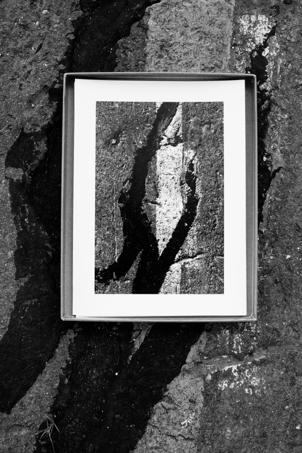 Sara VanDerBeek (b. 1976, United States) Past Present Highlighting the graphic gestures found written in the tar lines crisscrossing the pier, Sara VanDerBeek, upon her first visit to the pier, photographed a series of small, graphic moments inscribed on the pier’s surface. She subsequently instructed the photographer to rediscover and rephotograph those same signs – a memory action activated by the premise of the entire Pier 54 project.