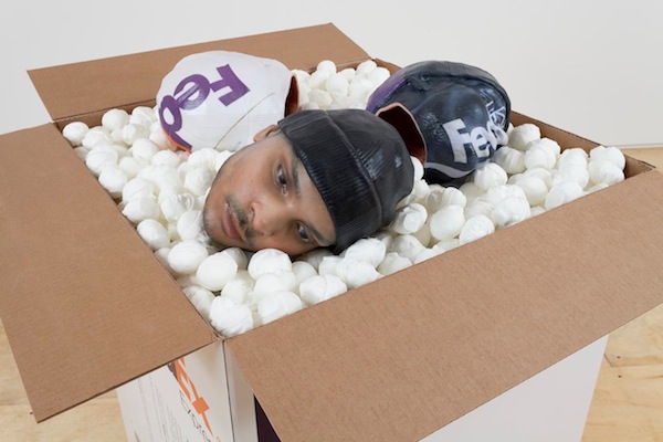 Josh Kline: Packing for Peanuts (Fedex Workers Head with Knit Cap), 2014