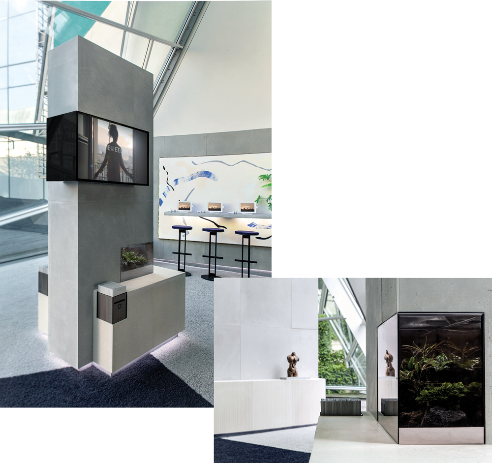 Installation views, 9th Berlin Biennale Christopher Kulendran Thomas New Eelam, 2016 Concrete, one-way mirrored glass, biosphere, LED, fridge, bottled water, leaflets and 45s silent lift from ‘New Eelam’ promotional film Images: Laura FiorioNew Eelam, 2016 Installation views, 9th Berlin Biennale Image: Joseph Kadow